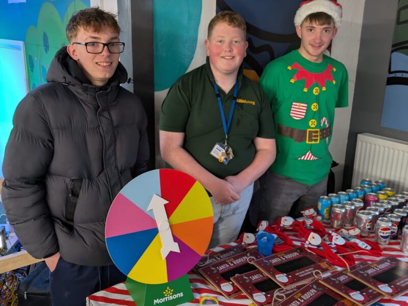 volunteers behind stall