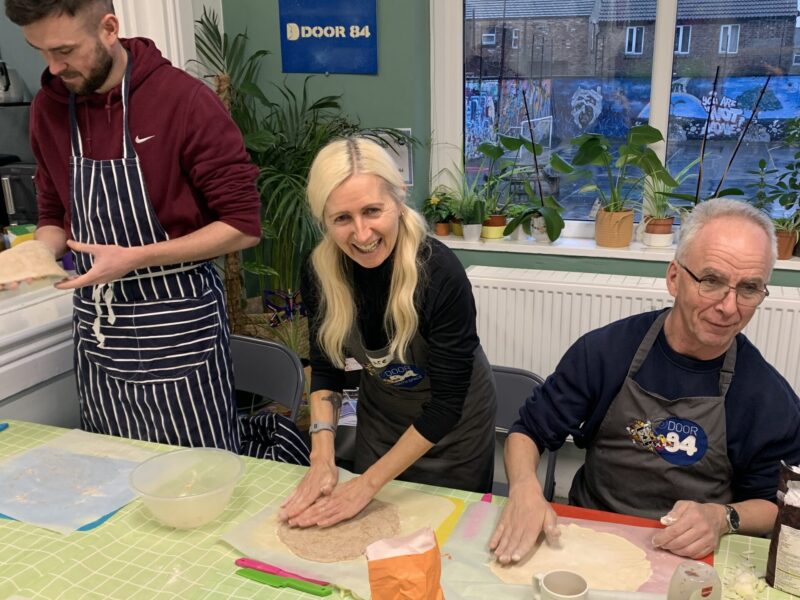 cooking course attendees making dough