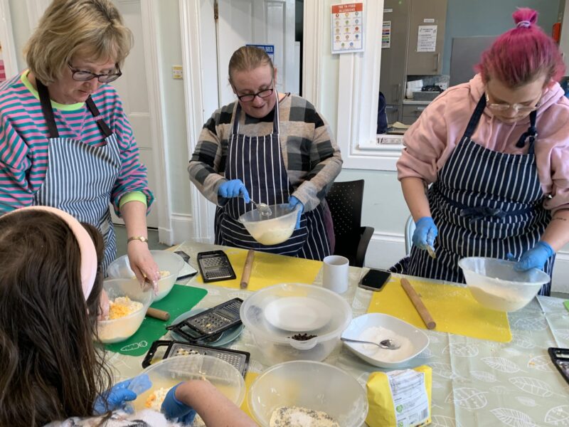cooking class attendees making dough