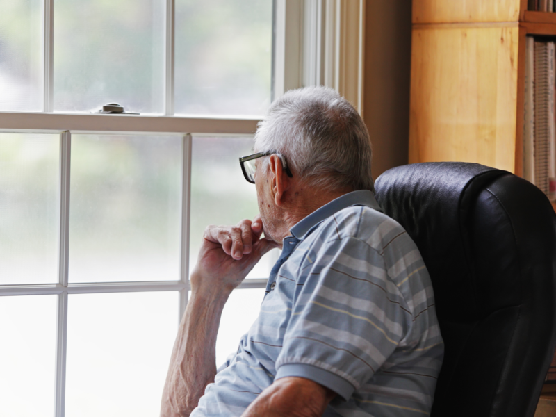 person looking out of the window